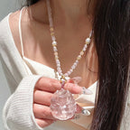 Renard à neuf queues en quartz rose – Charme et protection spirituelle