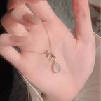 Collier Papillon Goutte de Quartz Rose - Attirez l'Amour et l'Énergie Douce