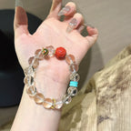 Clear Quartz & Red Sand Six Syllable Mantra Bracelet-Gather Blessings
