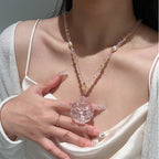 Renard à neuf queues en quartz rose – Charme et protection spirituelle