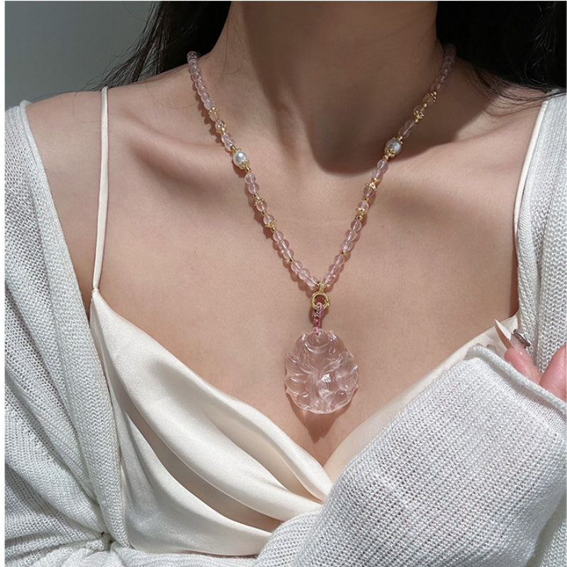 Renard à neuf queues en quartz rose – Charme et protection spirituelle