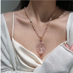 Renard à neuf queues en quartz rose – Charme et protection spirituelle