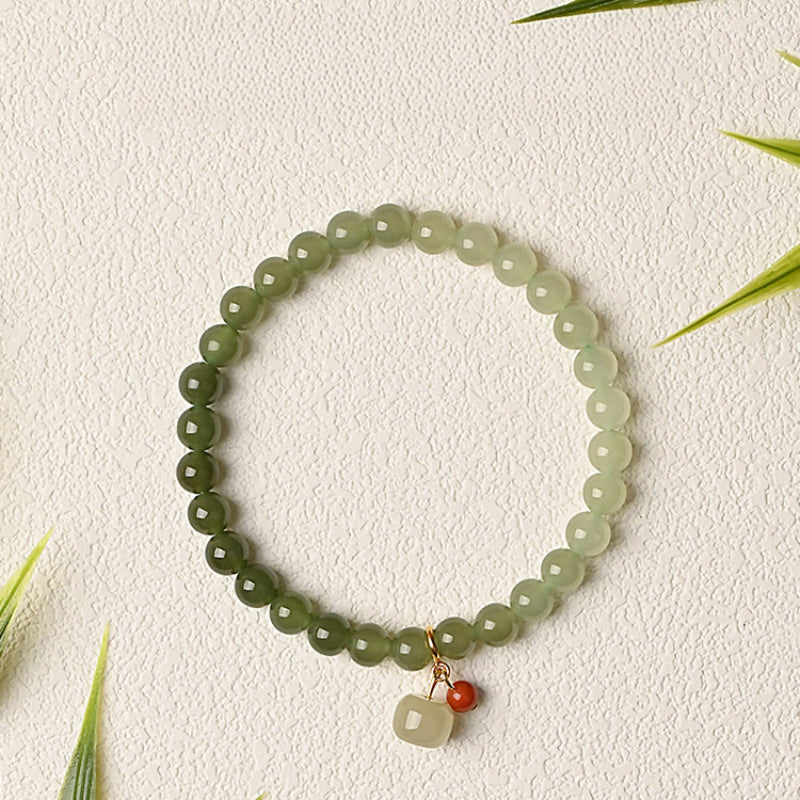 Bracelet en jade Hetian naturel Lotus Éclat Pur