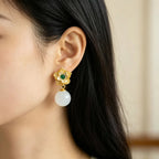 Boucles d'oreilles anciennes en argent sterling avec lotus en jade Hotan naturel