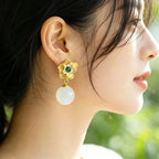 Boucles d'oreilles anciennes en argent sterling avec lotus en jade Hotan naturel
