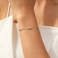 Bracelet délicat œil porte-bonheur en or