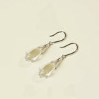 Boucles d'oreilles pendantes Magnolia en cristal naturel