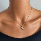 Triple-Ring Pearl Pendant Necklace - Purity and Softness