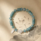 Bracelet de lotus en jadéite orientale avec breloque « Ping An Xi Le » – Bijoux Guochao
