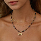 Collier mauvais œil à trois niveaux