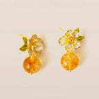 Boucles d'oreilles Camellia en cristal naturel