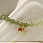 Bracelet en jade Hetian naturel Lotus Éclat Pur