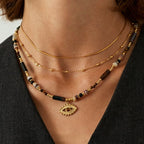 Collier mauvais œil à trois niveaux