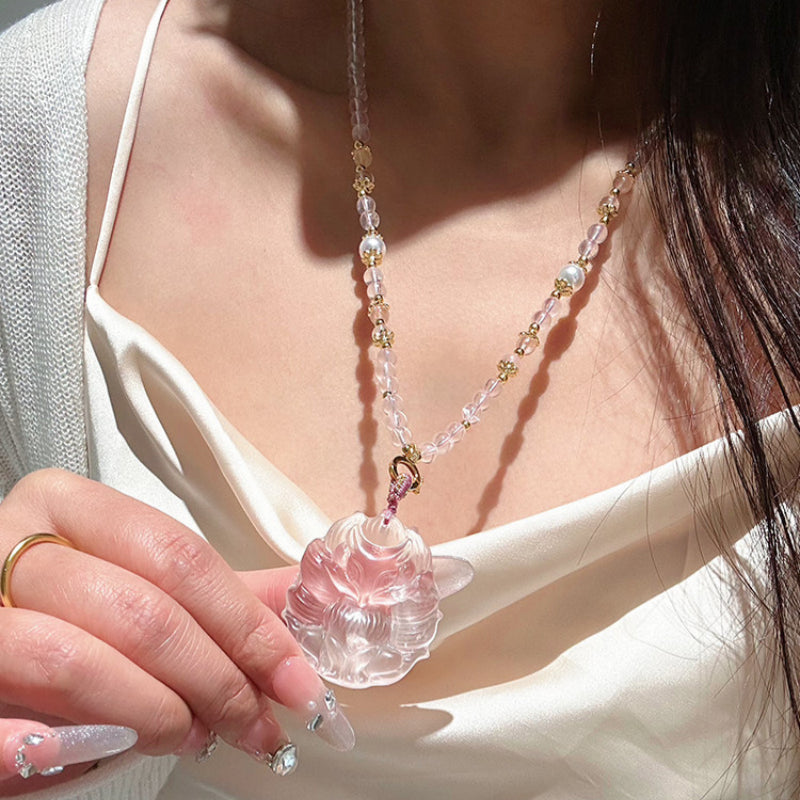 Renard à neuf queues en quartz rose – Charme et protection spirituelle