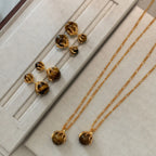 Collier en cristal de quartz clair Pendentif facetté irrégulier