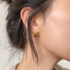 Boucles d'oreilles clous œil de tigre géométriques — Cristal Maillard de niche pour la fortune