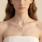 Collier en cristal de quartz clair Pendentif facetté irrégulier