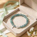 Bracelet de lotus en jadéite orientale avec breloque « Ping An Xi Le » – Bijoux Guochao