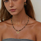 Collier mauvais œil à trois niveaux