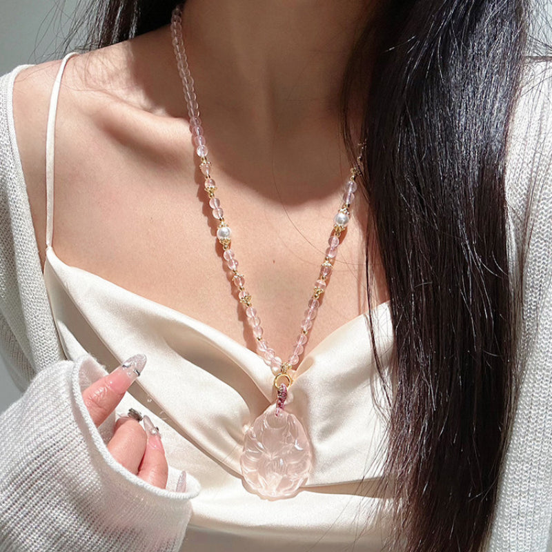 Renard à neuf queues en quartz rose – Charme et protection spirituelle