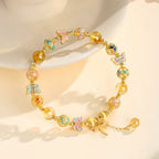 Bracelet en Cristal Naturel Papillon Doré
