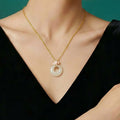 Elegant Magnolia Hetian Jade Peace Donut Necklace - Peace & Bliss