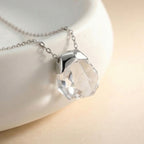 Collier en cristal de quartz clair Pendentif facetté irrégulier