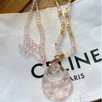 Renard à neuf queues en quartz rose – Charme et protection spirituelle