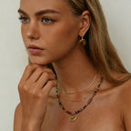 Collier mauvais œil à trois niveaux