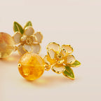 Boucles d'oreilles Camellia en cristal naturel