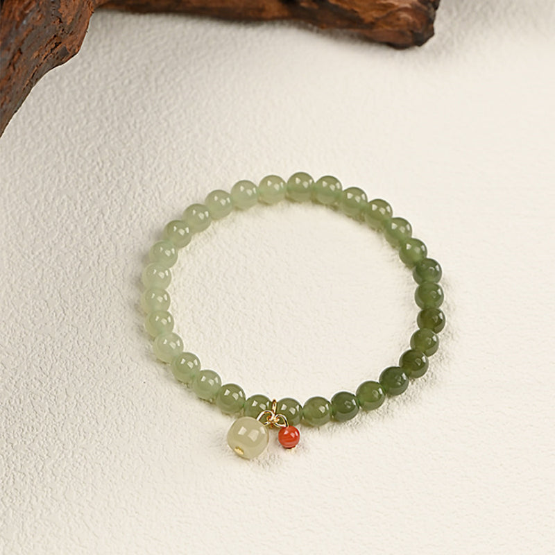 Bracelet en jade Hetian naturel Lotus Éclat Pur