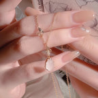 Collier Papillon Goutte de Quartz Rose - Attirez l'Amour et l'Énergie Douce