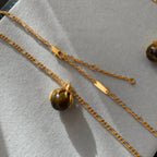 Collier en cristal de quartz clair Pendentif facetté irrégulier