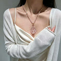 Renard à neuf queues en quartz rose – Charme et protection spirituelle