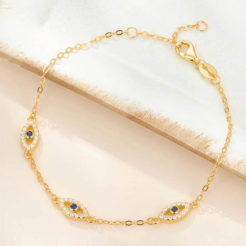 Bracelet délicat œil porte-bonheur en or