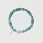 Bracelet de lotus en jadéite orientale avec breloque « Ping An Xi Le » – Bijoux Guochao