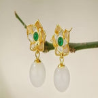 Boucles d'oreilles anciennes en argent sterling avec lotus en jade Hotan naturel