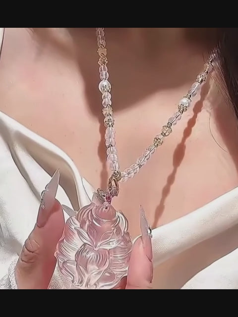 Renard à neuf queues en quartz rose – Charme et protection spirituelle