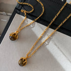 Collier en cristal de quartz clair Pendentif facetté irrégulier